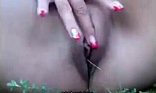 Short-haired blonde masturbates in the woods!