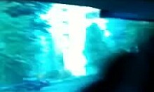 dirty girlfriends laugh and play with toys in the backseat of a car