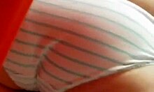 tanned blonde caught looking steamy in a hidden dressing room cam.