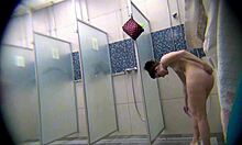 hot girlfriends stripping down and getting wet in the showers together