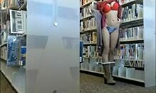 Slutty girlfriend crawling half-naked among bookshelves!