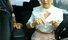 slutty babe in revealing panties masturbates in a car