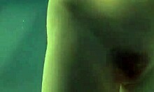 gorgeous chick flashes her pussy looking hot in changing room