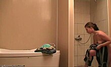 brunette strips naked in the shower