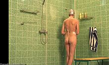 Slender beauty reveals her stunning figure while secretly filmed in a steamy bath.