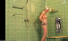 Slender beauty reveals her stunning figure while secretly filmed in a steamy bath.