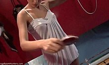 Amateur brunette strips naked in bathroom for hidden voyeur