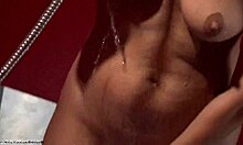 Smug tanned brunette showers seductively