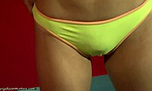 Busty short-haired blonde caught naked in showers on cam