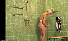 Slender beauty reveals her stunning figure while secretly filmed in a steamy bath.