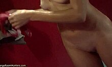 Curly-haired chick strips wet and shows perky tits 😏