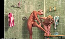 tanned babe showering with her pale girlfriend in steamy wet action