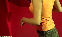 big-breasted blonde strips naked in bathroom