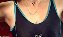 dead-eyed blonde undresses in changing room