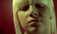 blond-haired beauty with awful bangs showing her small tits and skinny body in voyeur teen scene