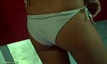 blond-haired beauty with awful bangs showing her small tits and skinny body in voyeur teen scene