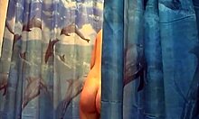 Voyeur video featuring a dark-haired babe in the shower