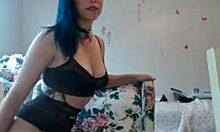 my girlfriend in black lingerie masturbating with a dildo on webcam