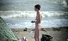 skinny girlfriend casually strips naked on a sunny beach