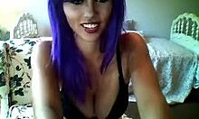 purple-haired camgirl shows playful webcam session
