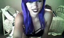 Purple-Haired Camgirl in Black Bra Dances Seductively on Webcam