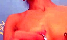 Long-haired skinny beauty with oily body prepares to insert anal beads into her pussy on webcam