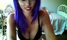 purple-haired camgirl shows playful webcam session