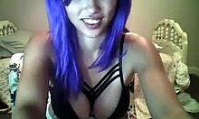 i'm a purple-haired naughty hottie with big natural tits teasing you on webcam while masturbating with a dildo