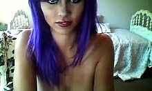 purple-haired camgirl shows playful webcam session