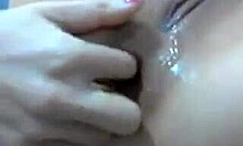 i'm a glasses-wearing asian chick fingering my asshole close-up on webcam, gapping it wide for you