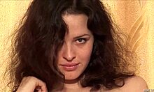 Pretty grey-eyed girl poses nude for camera