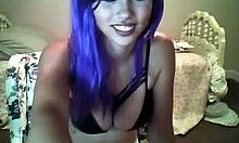 Purple-Haired Camgirl in Black Bra Smiles and Seduces on Webcam
