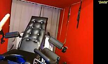 Busty blonde in glasses gets fucked by machine