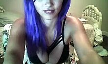 Purple-Haired Camgirl in Black Bra Smiles and Seduces on Webcam