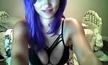 i'm a purple-haired naughty hottie with big natural tits teasing you on webcam while masturbating with a dildo