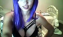 i'm a purple-haired naughty hottie with big natural tits teasing you on webcam while masturbating with a dildo