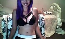 Purple-Haired Camgirl in Black Bra Smiles and Seduces on Webcam