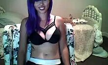 Purple-Haired Camgirl in Black Bra Smiles and Seduces on Webcam