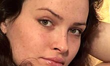 Pretty grey-eyed girl poses nude for camera