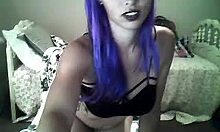 Purple-Haired Camgirl in Black Bra Dances Seductively on Webcam