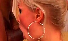 Big black cock covers her blonde face!