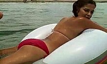 Perfect girl with great ass enjoying in the water, teasing her big tits?