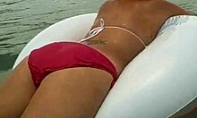 Perfect girl with great ass enjoying in the water, teasing her big tits?