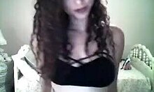 Frizzy hair camgirl shows her tight teen body on webcam