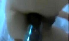 Asian girlfriend plays with toys on webcam