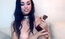 Fishnets-wearing amateur GF fucks her pussy with a toy on webcam, showing big natural tits and big ass