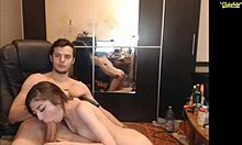 Skinny brunette girlfriend gives a blowjob to her boyfriend's big cock on webcam