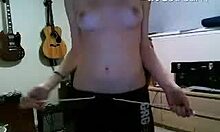 dark-haired camgirl flashes her big tits