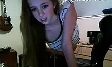 dark-haired camgirl flashes her big tits