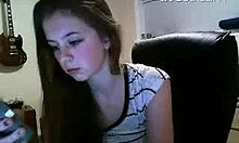 dark-haired camgirl flashes her big tits